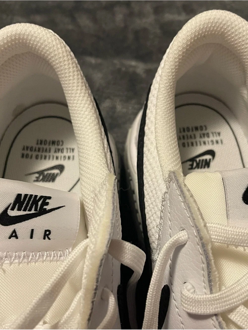 Nike White Sneakers with Black Swoosh